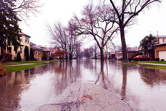 a flooded street threatening homes that have Flood Insurance in Brooklyn, Dumbo, NY, Prospect Park, NY, Bushwick, Jersey City, Williamsburg, NY